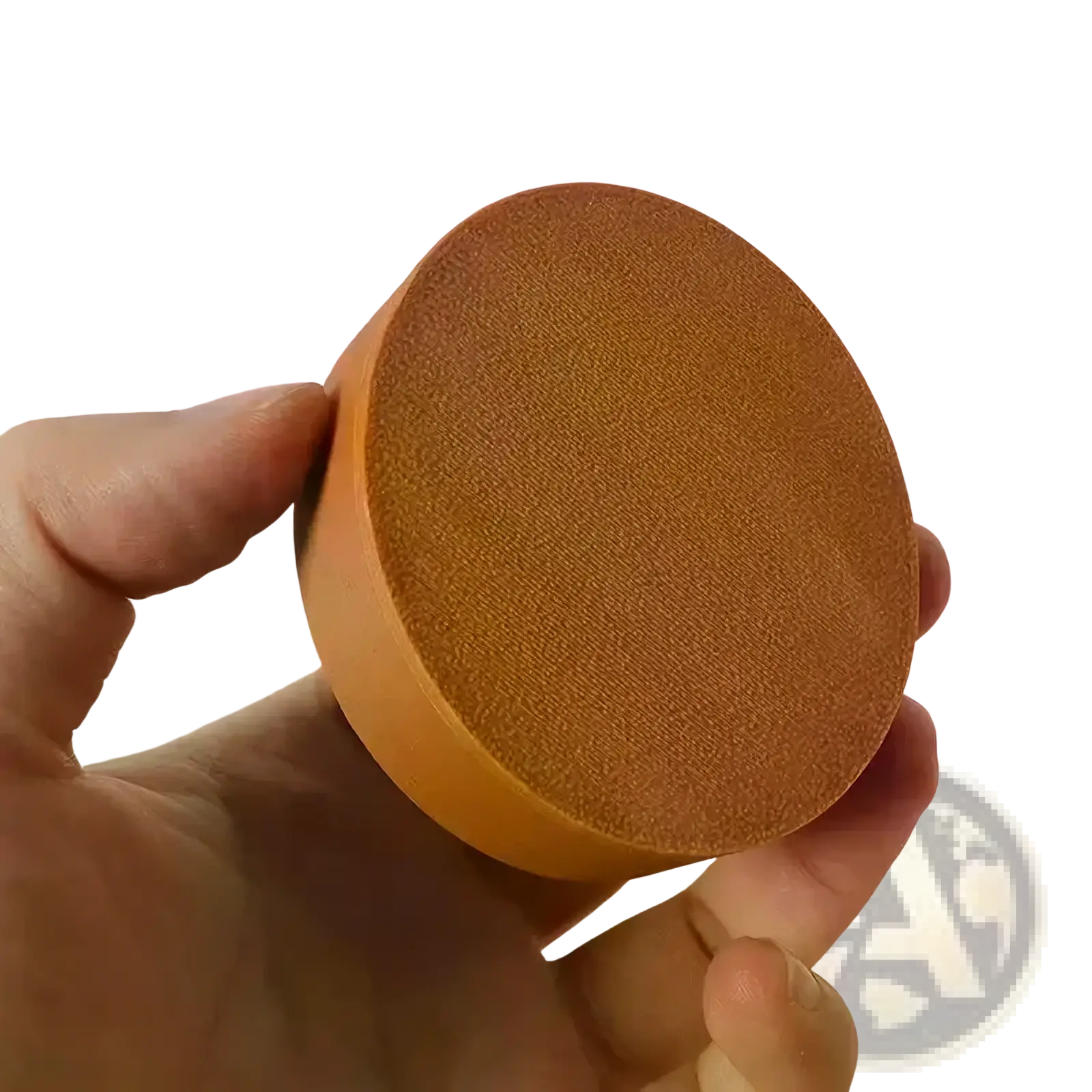 A round orange sponge with a textured surface for use in a dollhouse wall cabinet miniature wooden display shelf