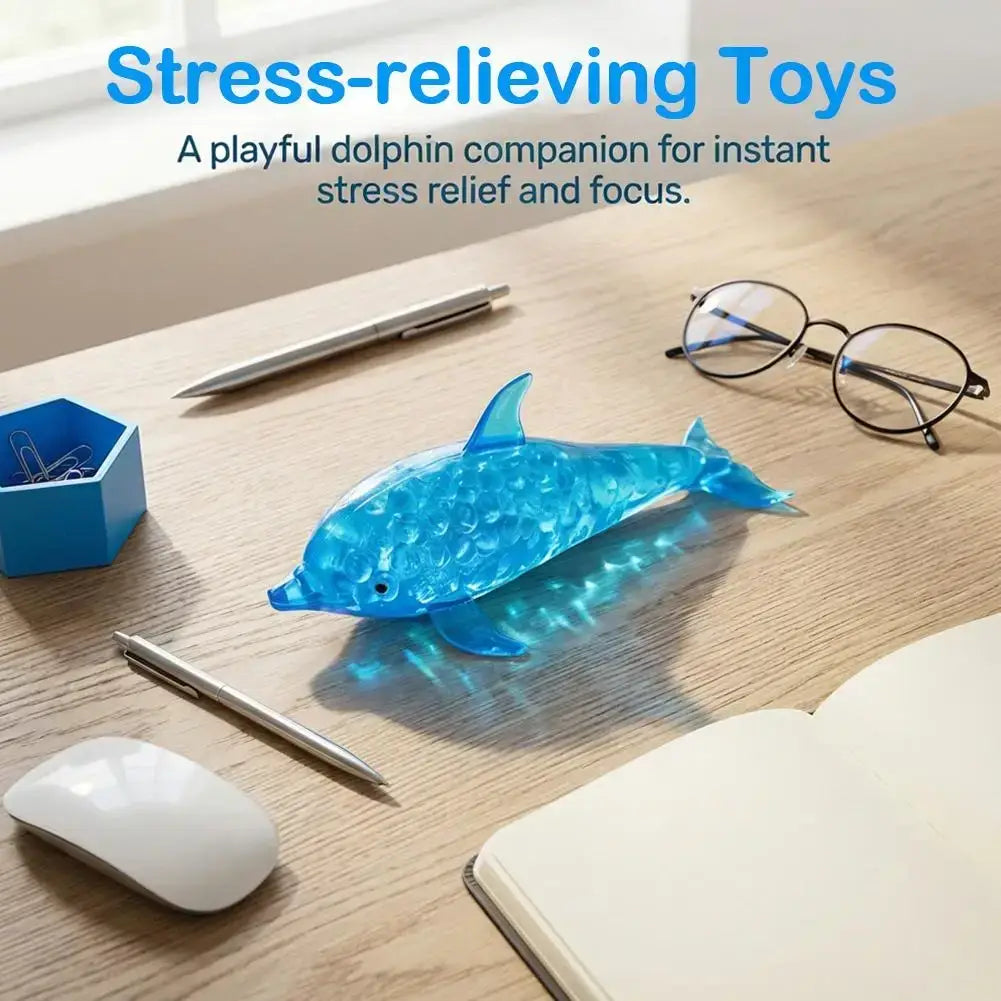 A translucent blue dolphin shark stress relief toy with a textured faceted surface for sensory fidget use