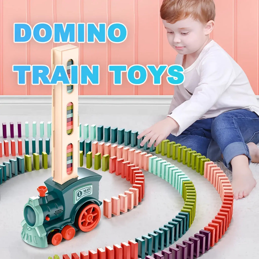 Green and red plastic train engine on wooden tower track in domino train toy automatic electric building blocks set