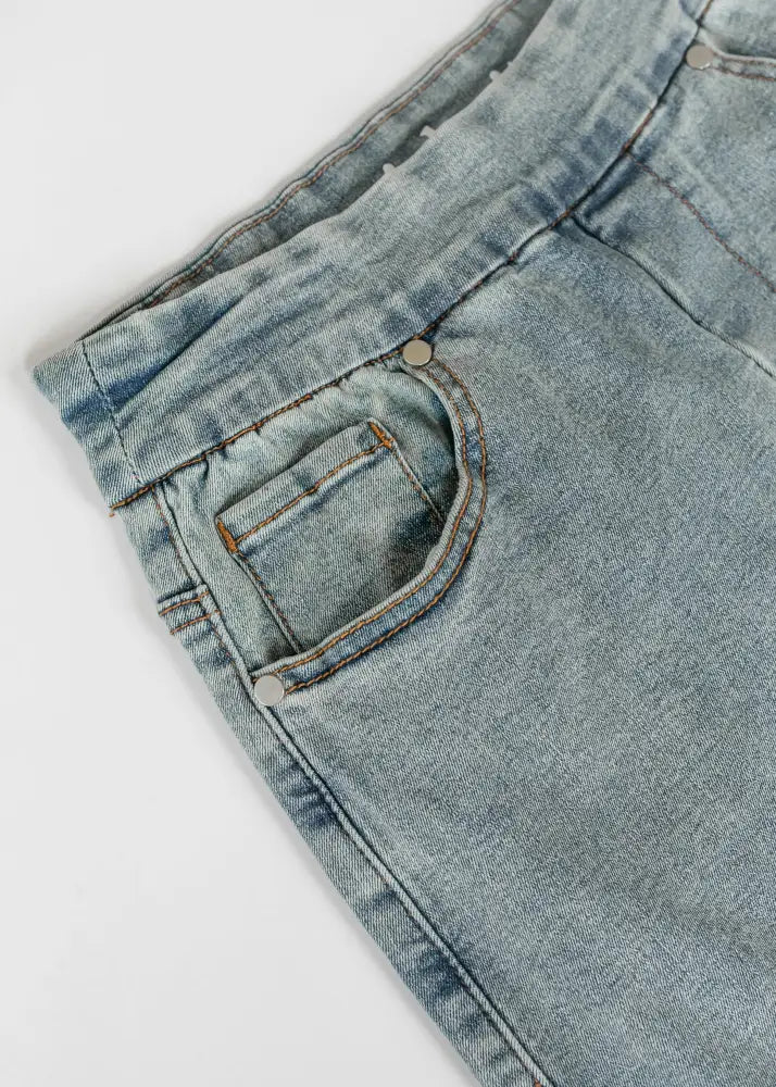 Donna classic wash stretch denim maxi skirt in light-wash with subtle fading and functional pockets