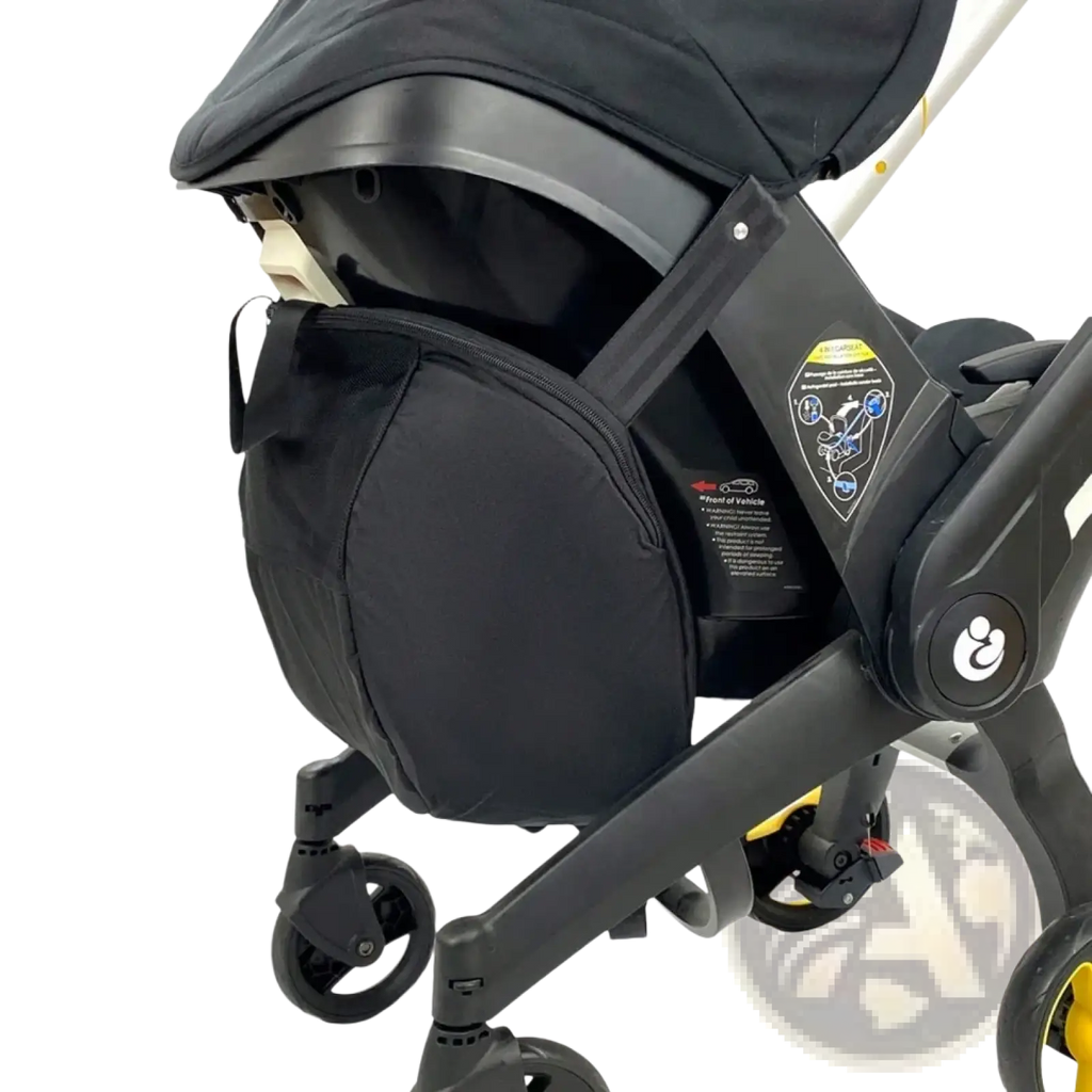 Black fabric Doona stroller storage bag with zipper closure and adjustable strap for travel use