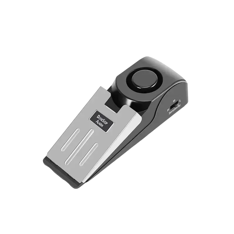 Black and silver door stop alarm with circular sensor button and textured metallic finish for door stop security