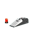 Black and silver door stop with integrated alarm door system and red flashing light for home security wedge