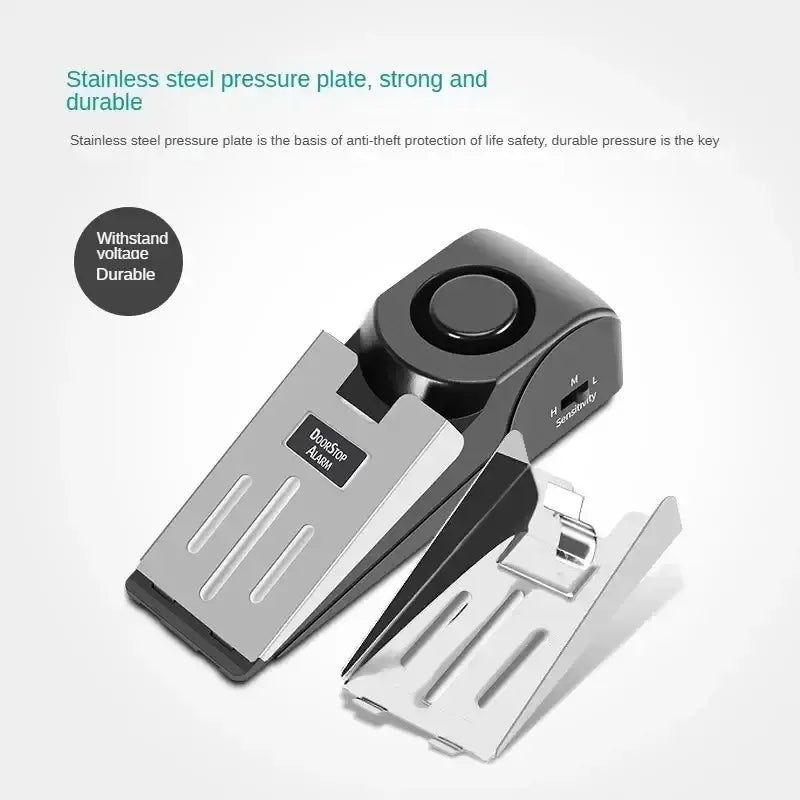 Black and silver stainless steel door stop alarm with adjustable sensitivity settings for enhanced security use