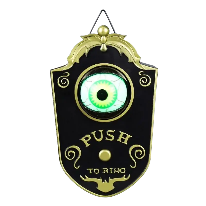Black and gold ornate doorbell haunted with a glowing green eye horror prop made in mainland china for spooky decor