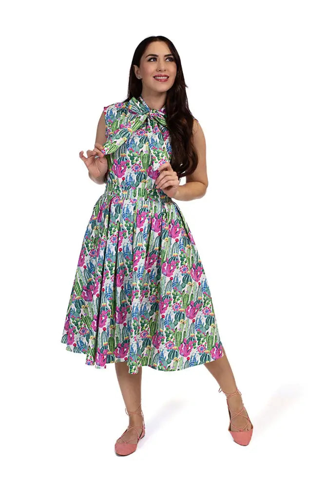 Doris cactus floral a-line midi skirt with pockets featuring a vibrant sleeveless floral and cactus print on light green
