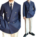 Double breasted navy blue tuxedo jacket with gold buttons and textured weave closure type for groom wear