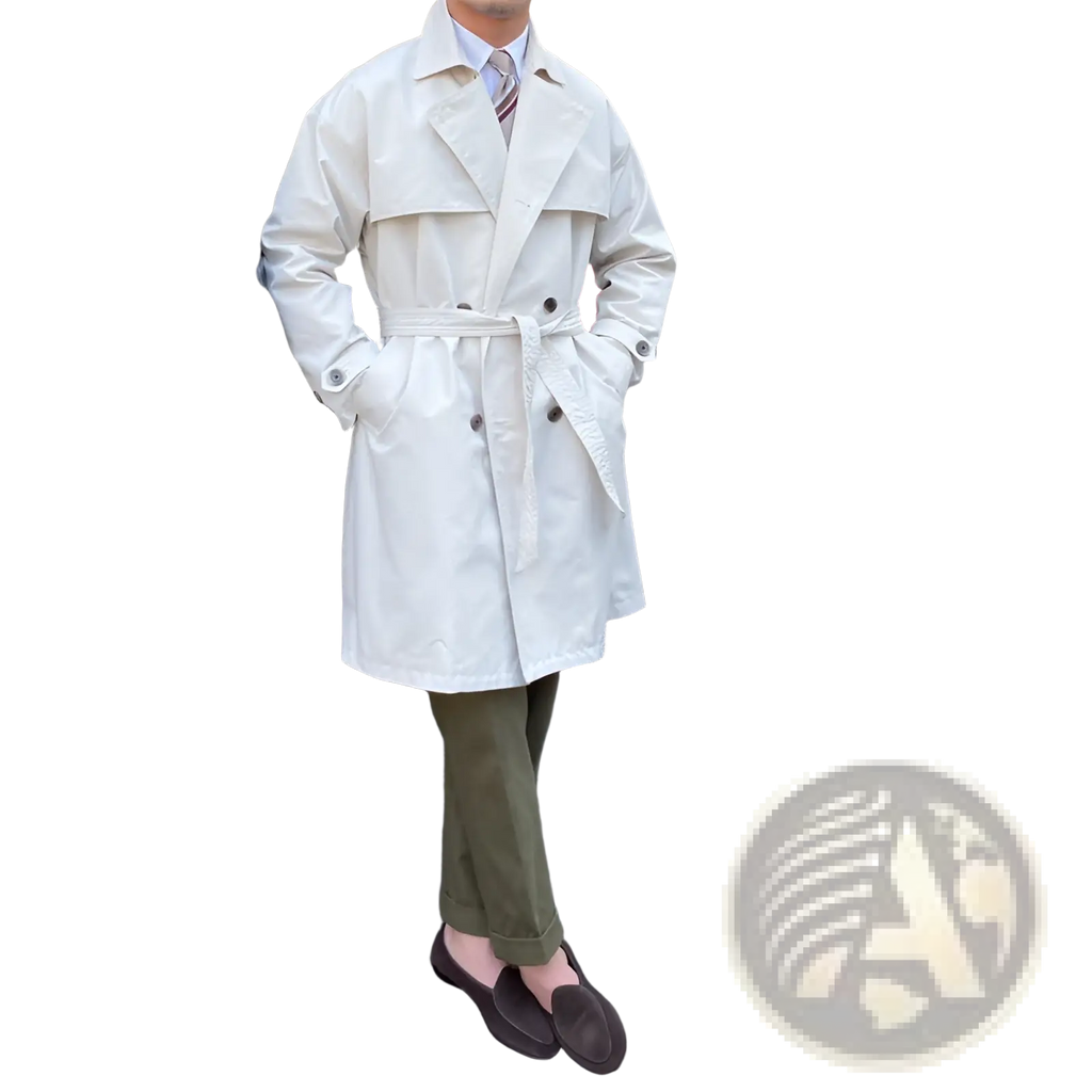 Cream-colored double breasted trench coat for men with belted waist in lightweight fabric for stylish outerwear