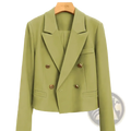 A sleek olive green double-breasted women office blazer with gold toned buttons and tailored fit on wooden hanger