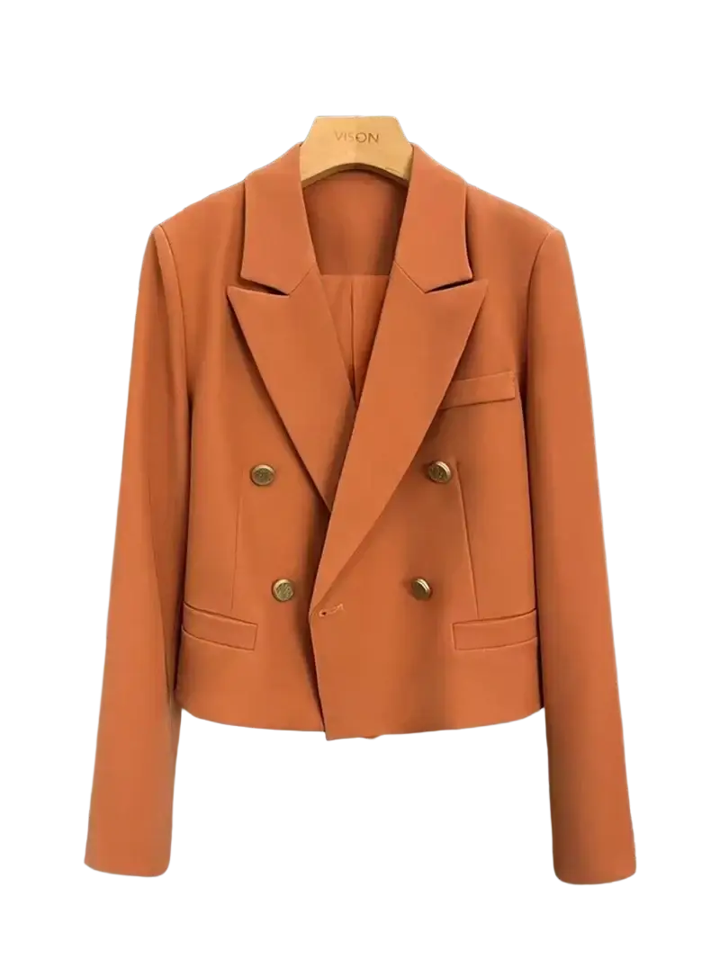 Double breasted women office blazer in burnt orange with gold buttons and a tailored structured fit