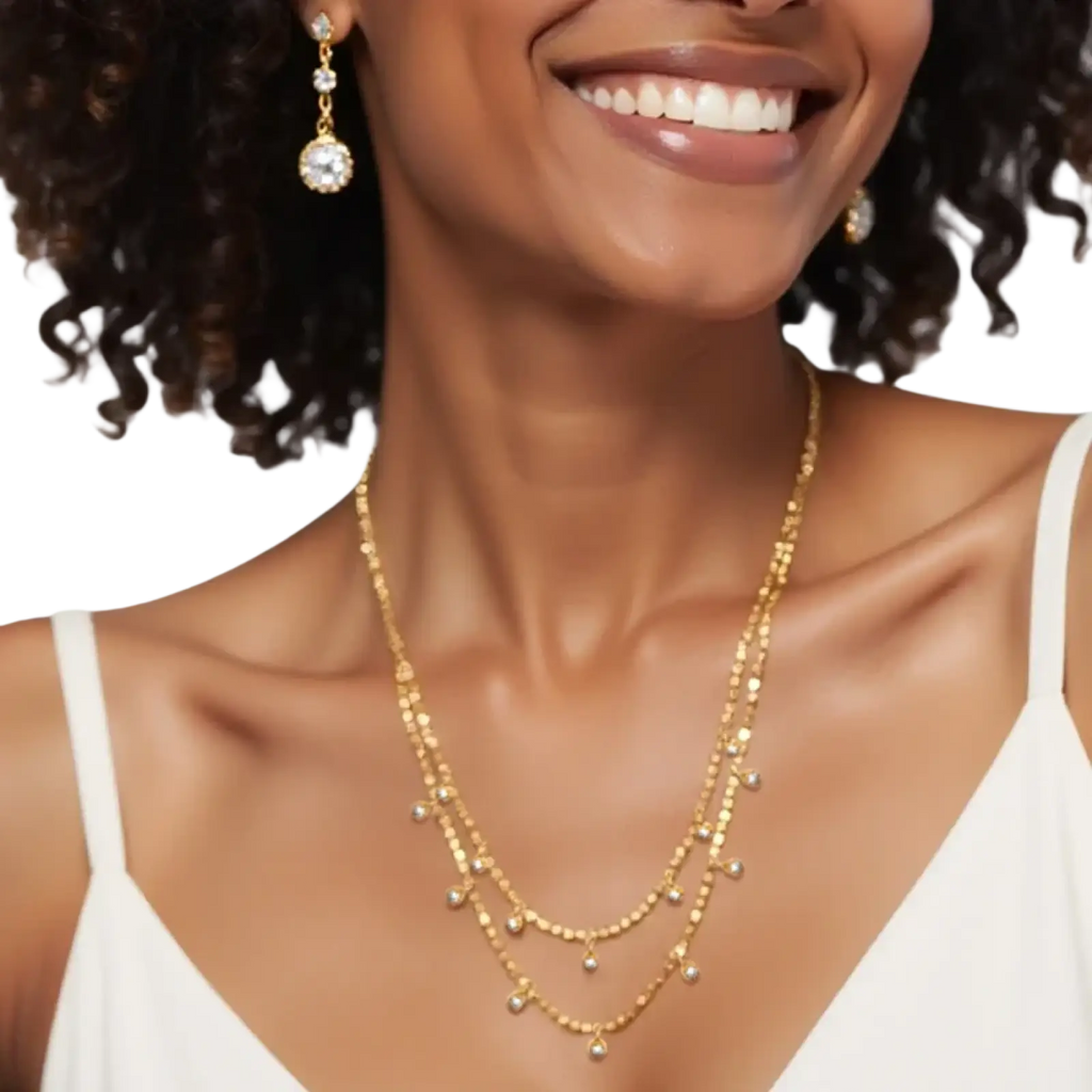 Double choker crystal beaded necklace in gold tone stainless steel with layered delicate chains and pearl-like accents