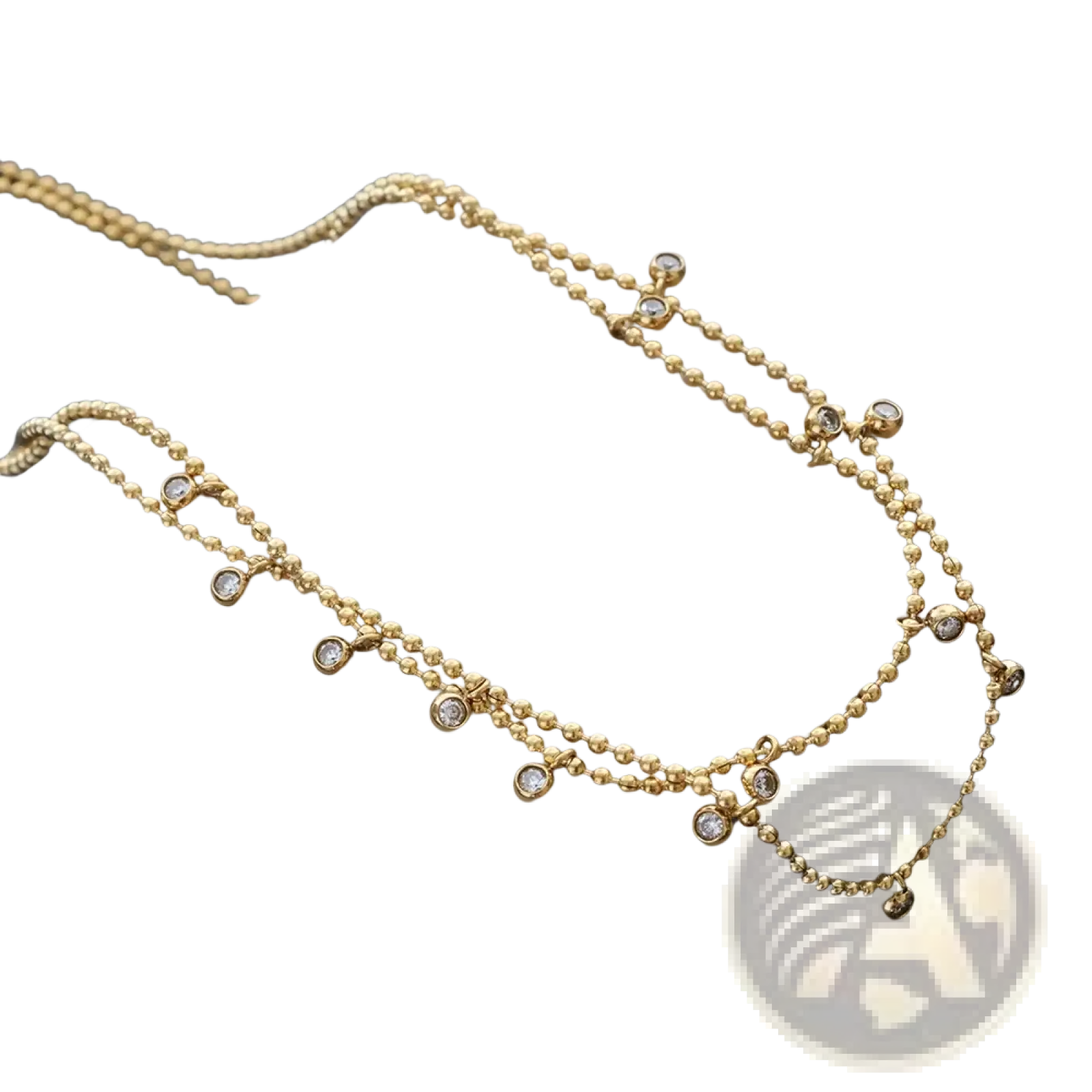 Gold-toned double choker crystal beaded necklace in stainless steel displayed on a beige presentation box