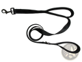 Black nylon double handle reflective dog leash with silver metal hardware and a sturdy handle for secure walking