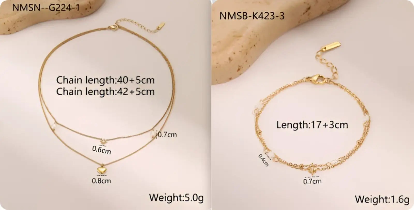 Gold-toned double-layer stainless steel necklace with delicate chain links and small heart-shaped pendant