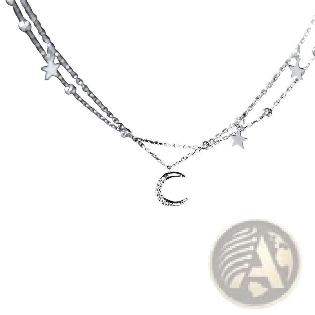 Double layer silver necklace with crescent moon pendant and crystal star charms on delicate chains
