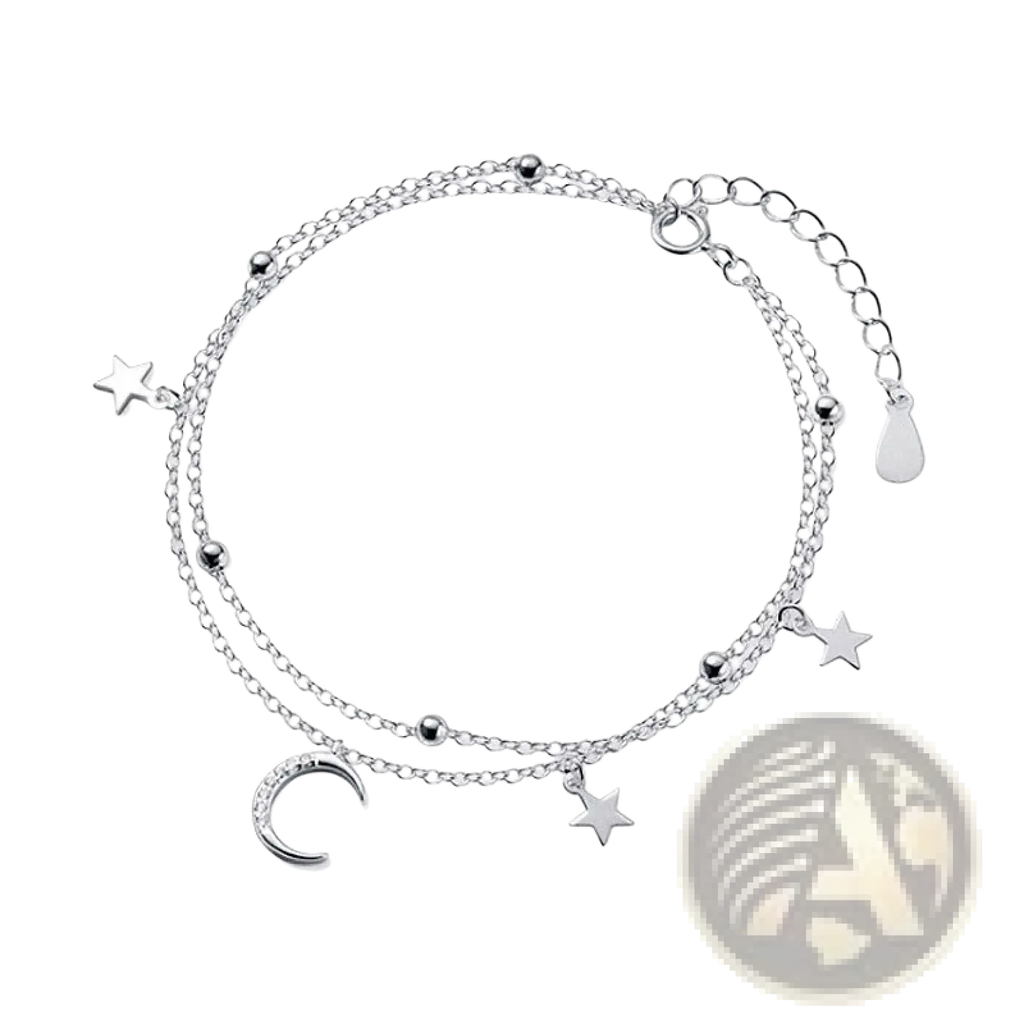 Silver double layer anklet with moon and star charms and small spherical beads in a crystal design