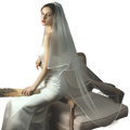 Delicate double layer white tulle short veil with hair comb featuring translucent fabric and subtle gathered detailing shown from back