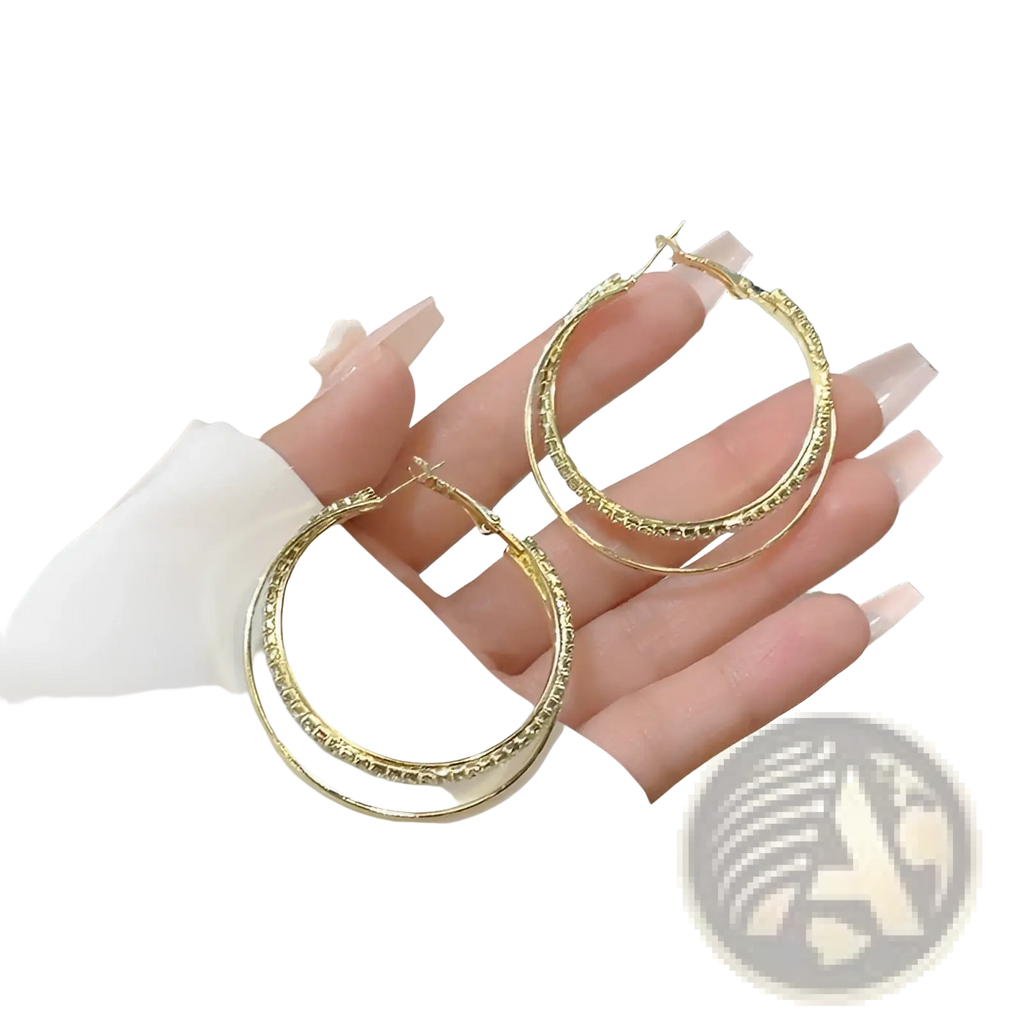 Gold-toned double layered crystal pave hoop earrings with sparkling rhinestone accents for elegant wear