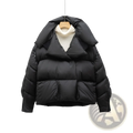 Black down puffer jacket with voluminous hood and two front pockets displayed on wooden hanger Korean style