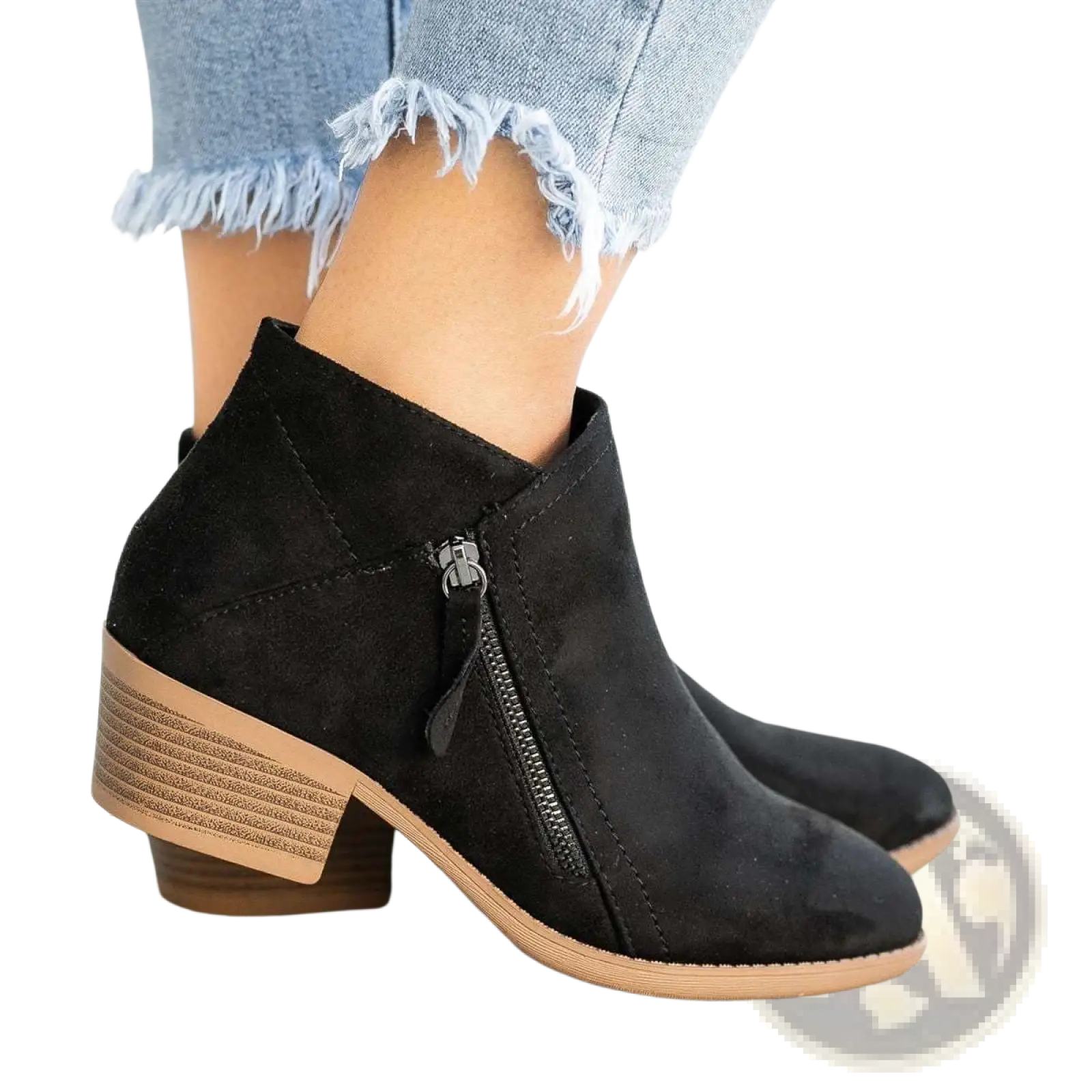 Black suede dr martens ankle boots with tan stacked chunky heel and side zipper closure visible from back side