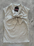 White cotton sleeveless retro legends blouse with dark green dragonfly pattern and matching bow at the neckline