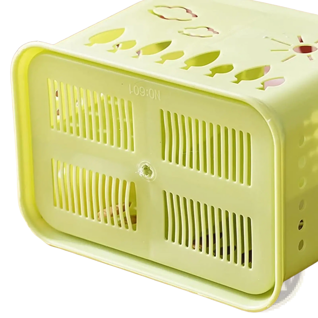 Light green plastic draining chopstick holder with leaf and sun cutout designs for space saving utensil organization