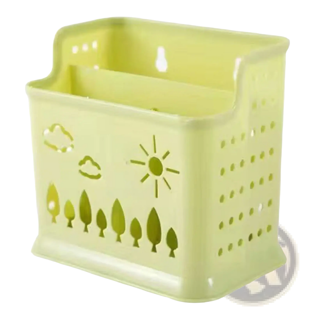 Light green plastic draining chopstick holder with sun clouds and tree cut-out designs for space-saving utensil organization