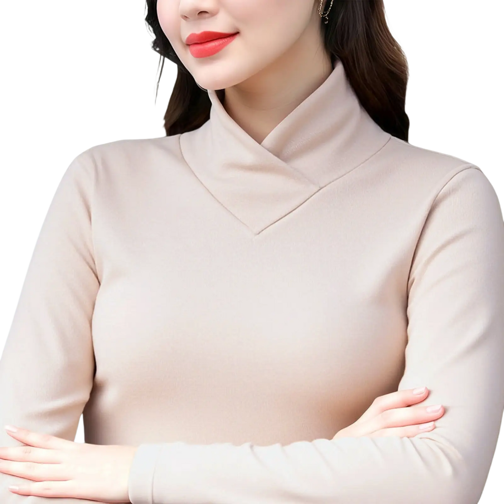 Beige dralon turtleneck thermal base layer top with smooth form-fitting fabric and long sleeves for warmth and comfort