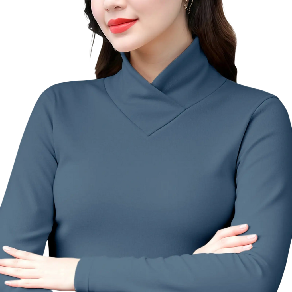 A sleek dark blue dralon turtleneck thermal base layer top with long sleeves and smooth fabric