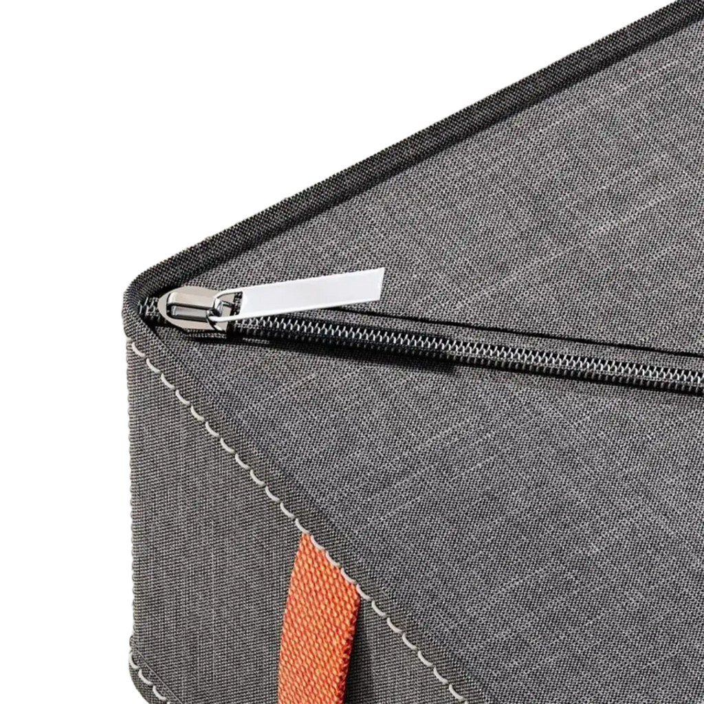 Gray textured fabric drawer organizer box for underwear and socks with silver zipper and orange webbing strap