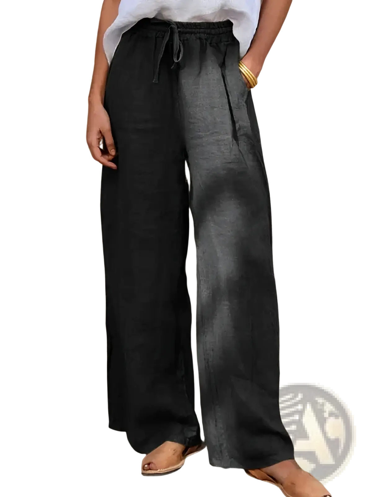Black linen wide leg pants with a drawstring waistband designed for casual comfort and versatile wear