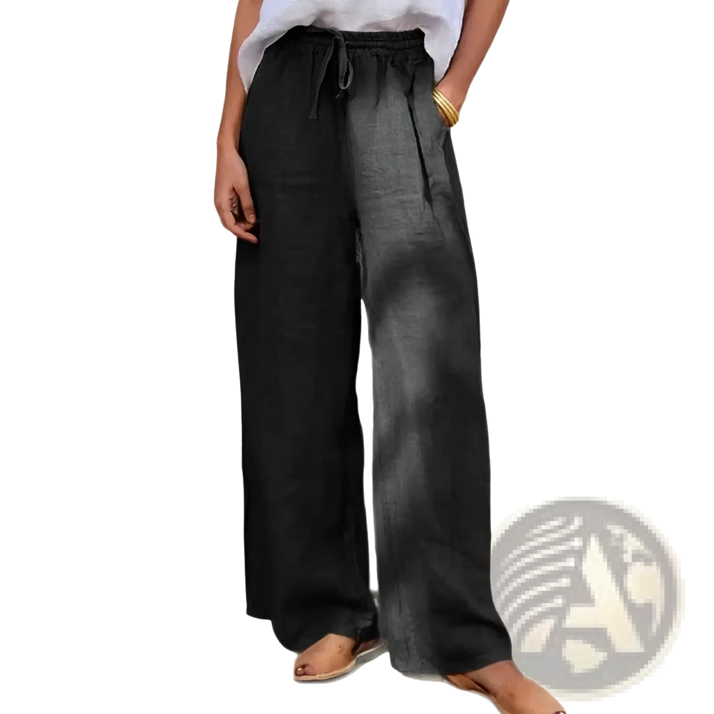 Black wide leg linen pants with a drawstring waistband ideal for comfortable and stylish casual wear