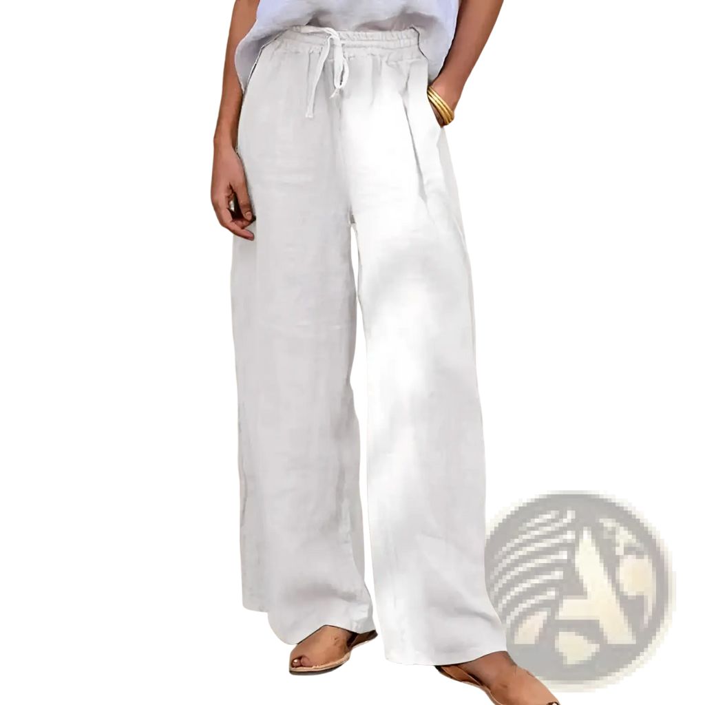 White linen drawstring wide leg pants with side pockets offering comfortable and breathable casual wear