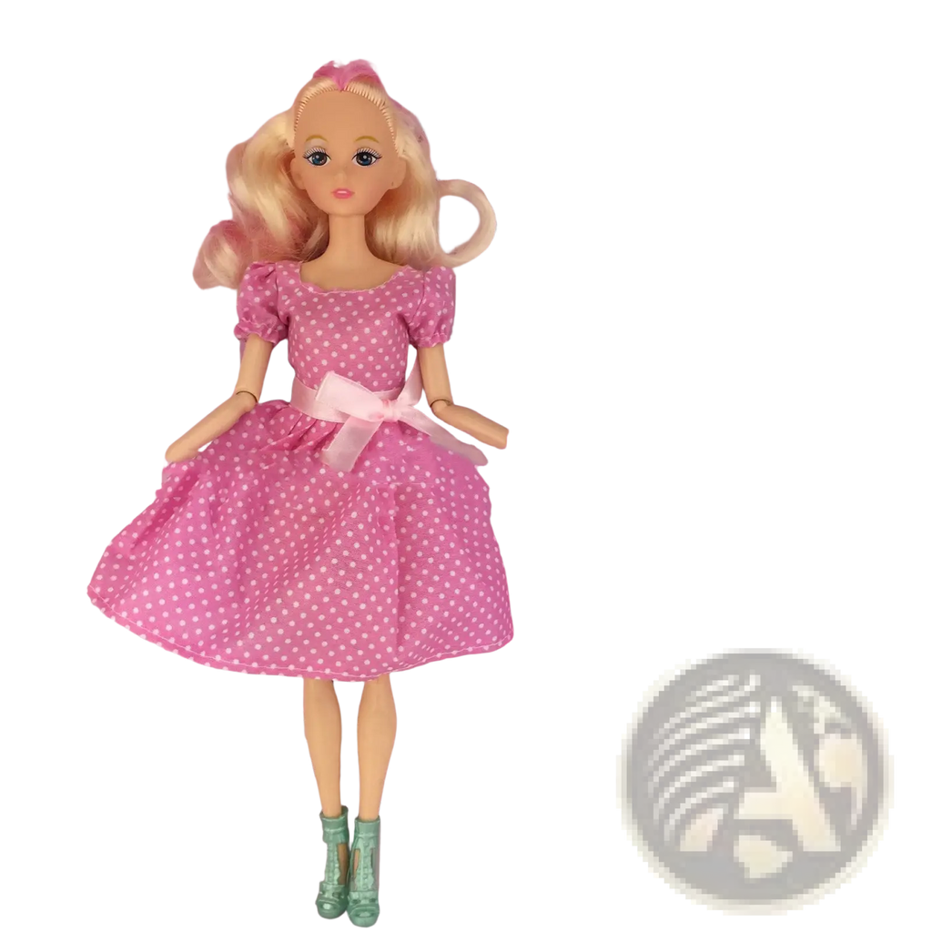 A blonde dress up doll wearing a pink polka dot fashion suit dress with a matching bow and light green boots