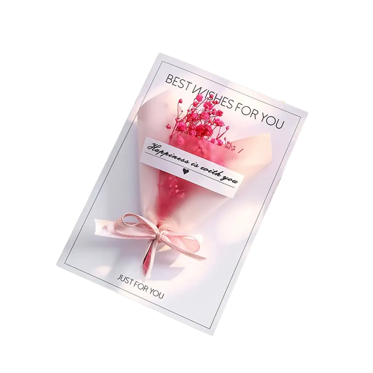 A delicate pink dried flower greeting card handmade gift bouquet wrapped in sheer tissue with best wishes message