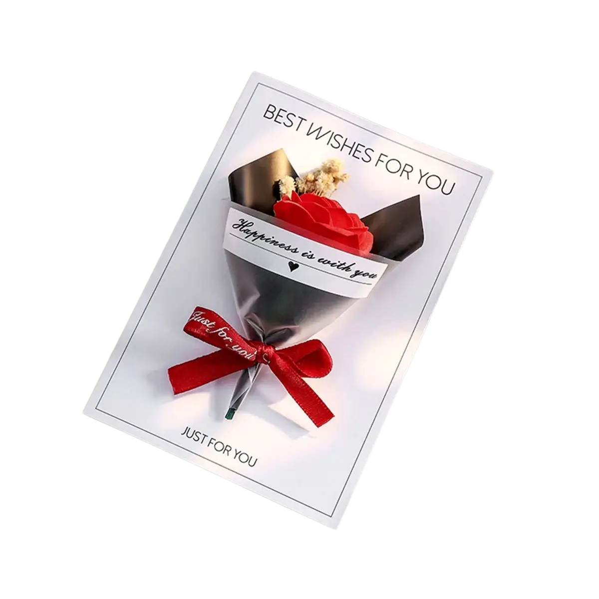 A vibrant red artificial rose in black paper wrap with a red ribbon bow in a dried flower greeting card bouquet