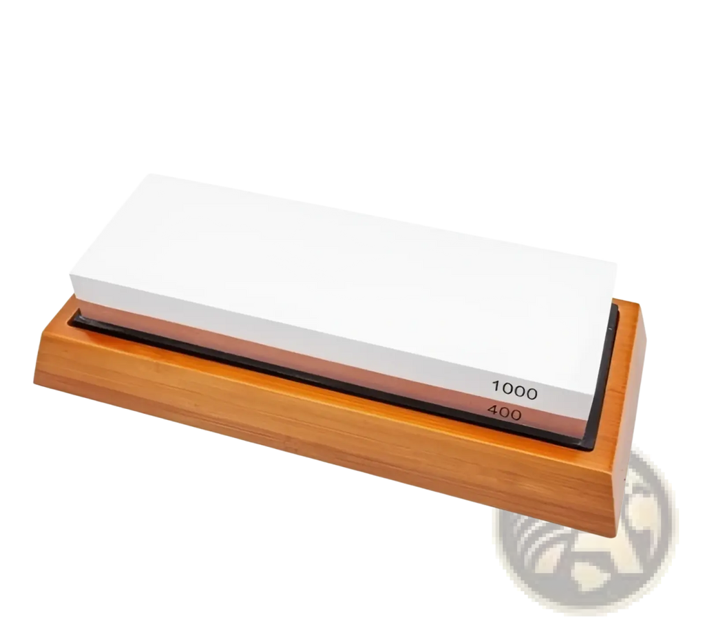 Wooden base holding a dual sided whetstone with white 1000 grit and brown 400 grit abrasive surfaces for sharpening