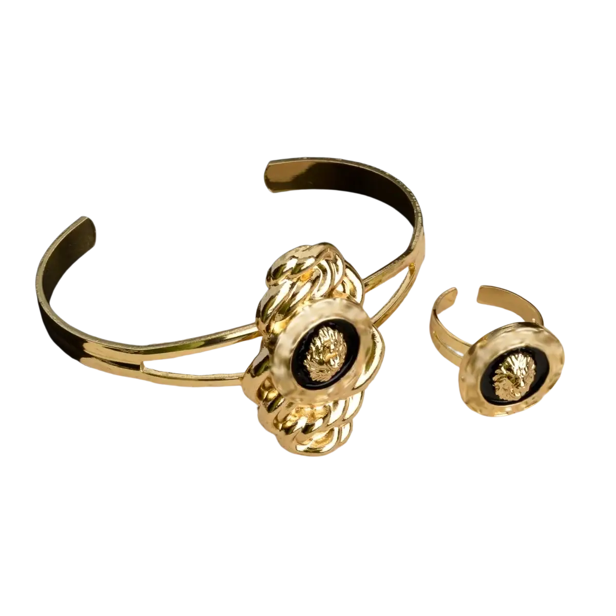 Dubai 18k gold lion jewelry set with gold-toned metal bracelet and ring featuring intricate lion head designs and black inlays