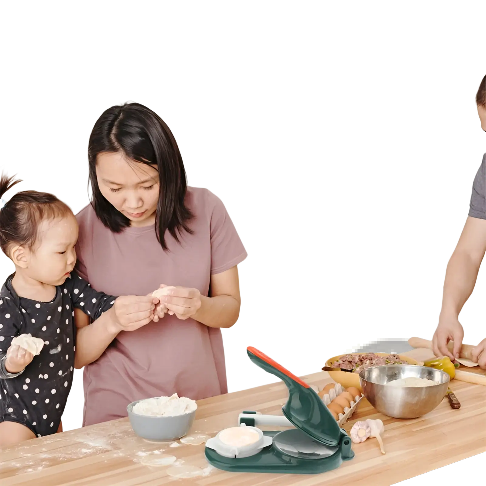Green and red manual dumpling maker 3 in 1 dough pressing tool on wooden countertop for home use
