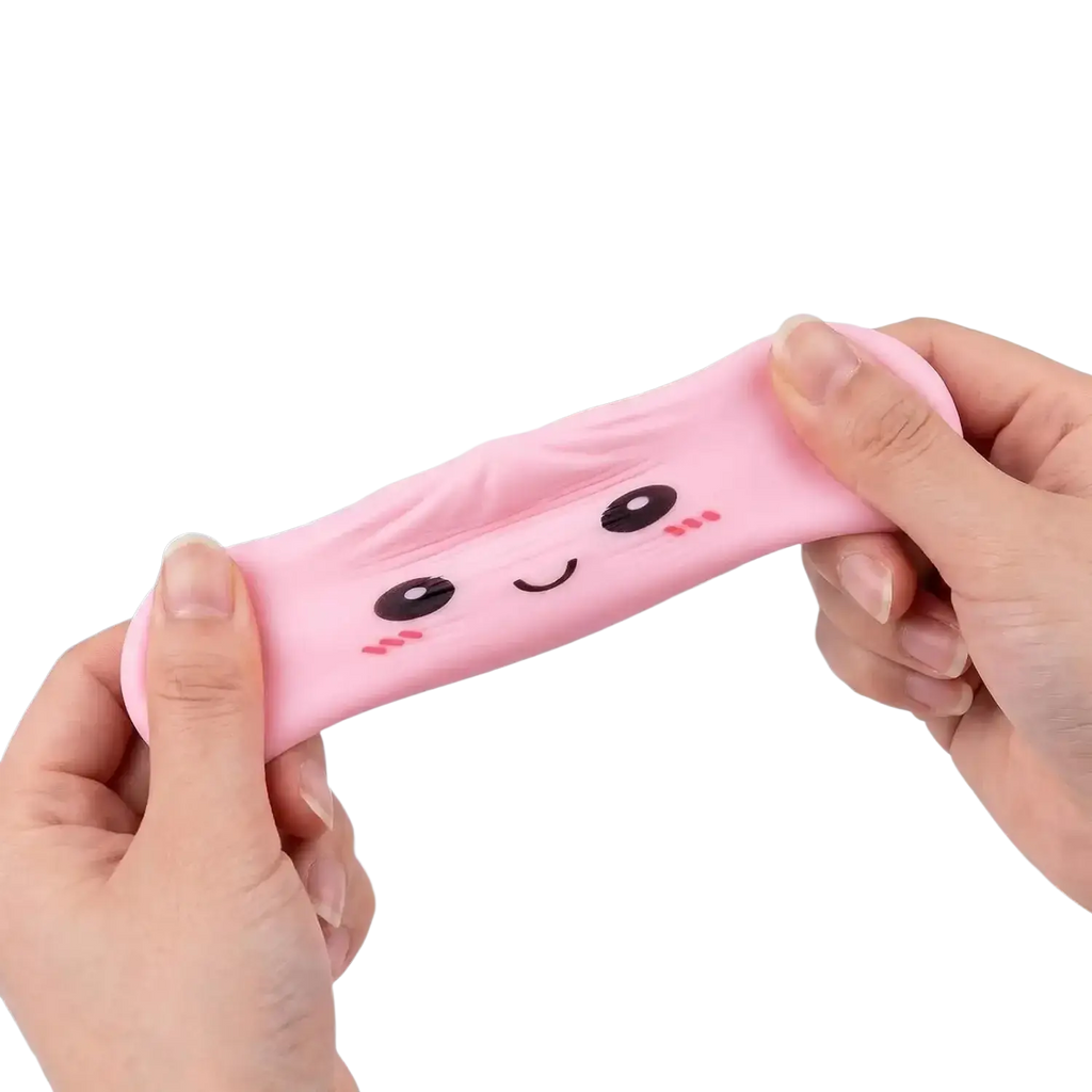 Pink silicone dumpling squishies stress ball with cute cartoon face rosy cheeks and smiling mouth in advent calendar set