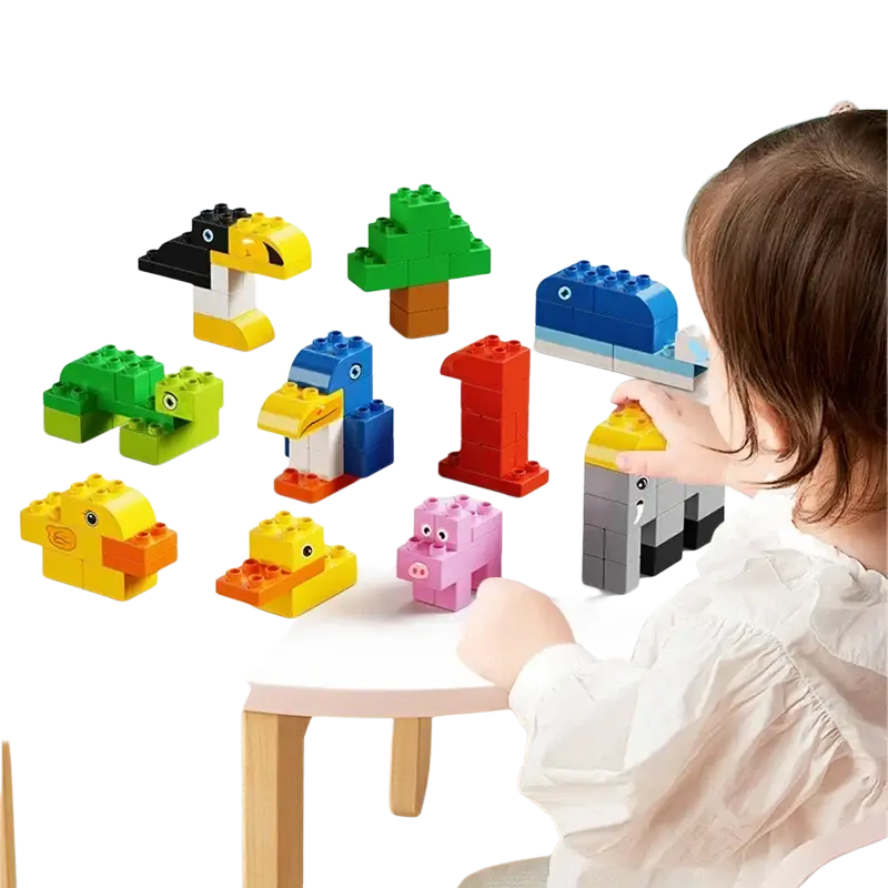A child holds a gray and black elephant duplo compatible bulk building block toy with colorful plastic animal figures
