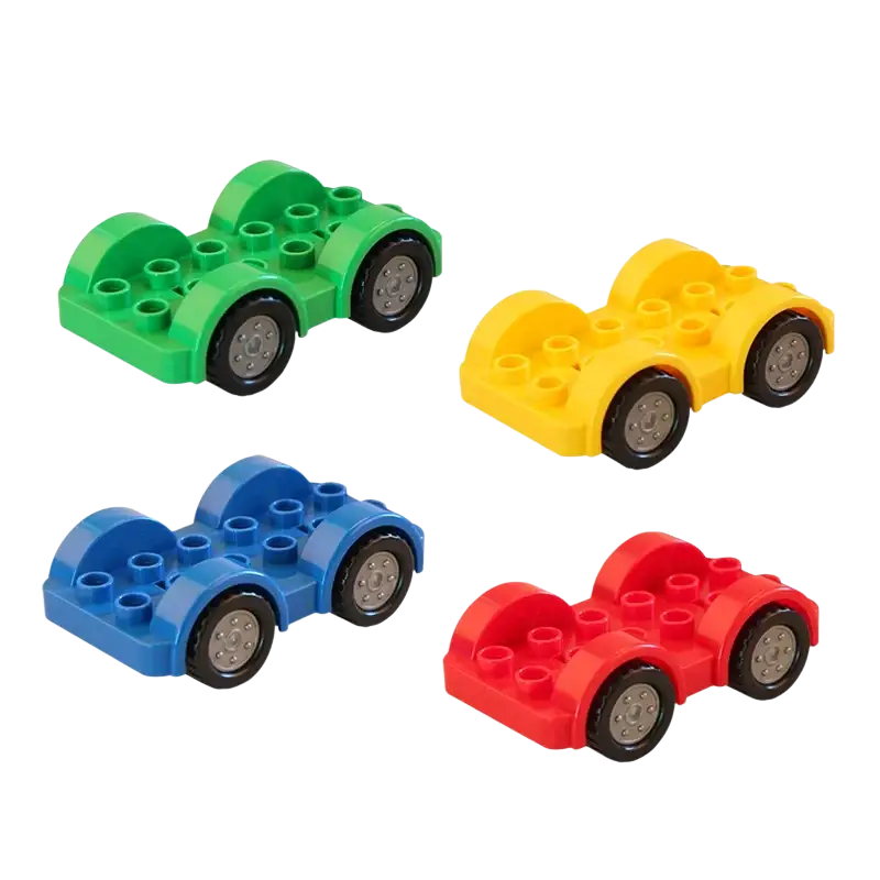 Duplo compatible bulk building blocks featuring color-random plastic wheels with black rubber tires and silver hubcaps