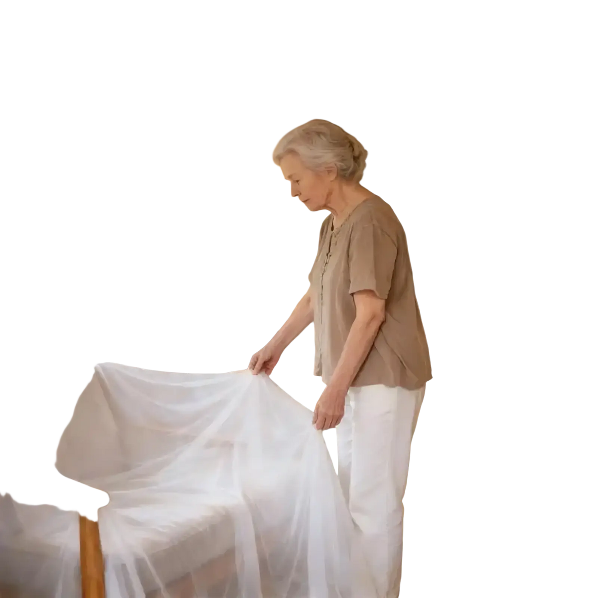 A delicate white sheer fabric dustproof furniture protection film cover draped over a wooden-framed sofa