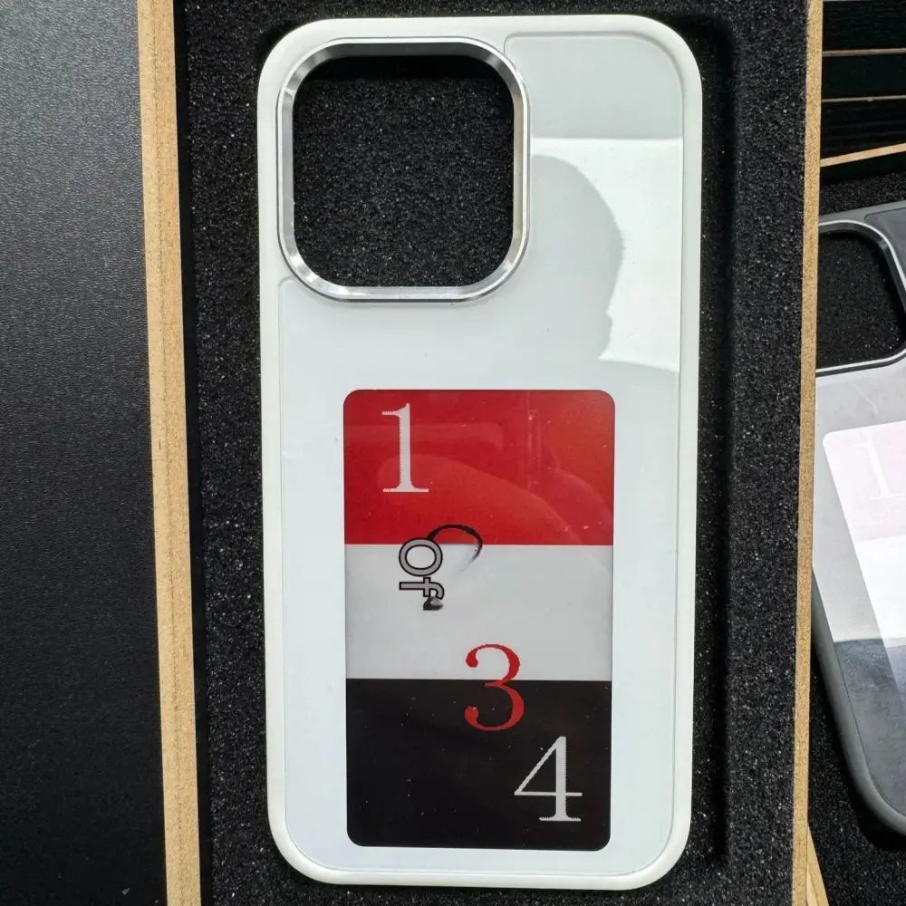 Back side of a personalized e-ink smart display luxury phone case with a white frame transparent glass and red black stripe design