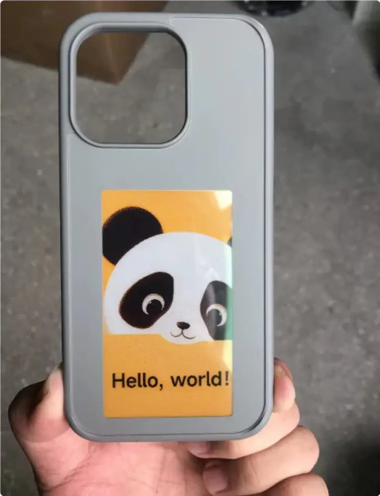 Back side of a gray personalized e-ink smart display luxury phone case with a cartoon panda sticker on orange