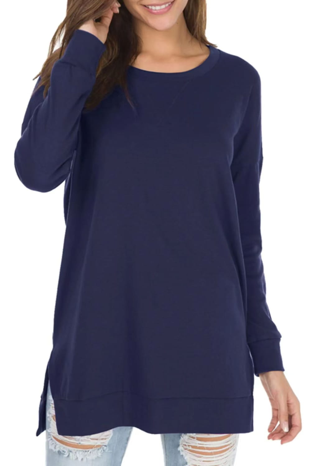 Navy blue long-sleeved split front relaxed knit sweater with side slits and a comfortable fit.