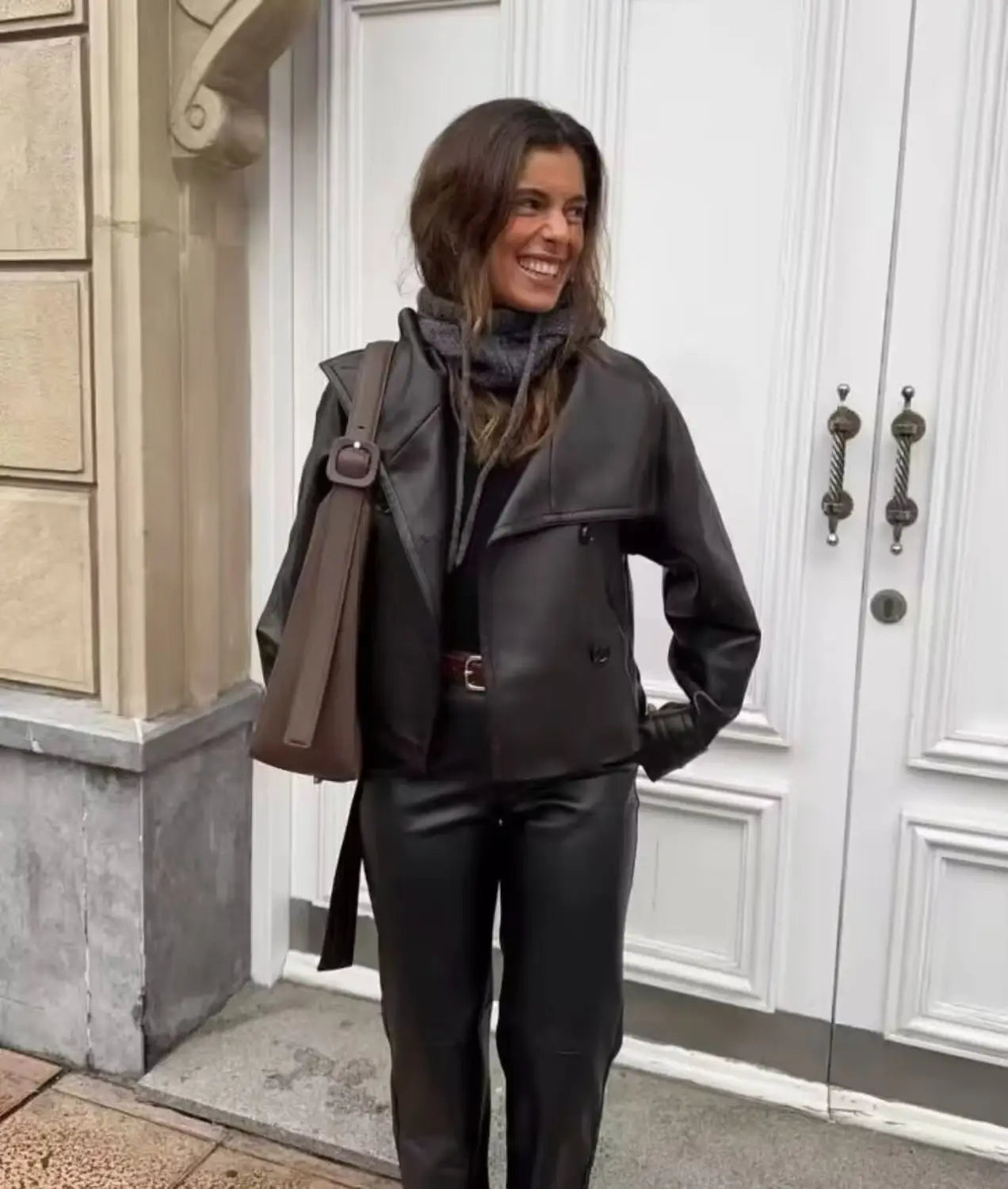Black leather moto jacket with a hood and double breasted front featured as faux leather double breasted belted trench coat.