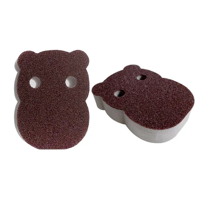 brown bear-shaped nano emery sponge rust and stain remover tool with textured abrasive surface and white foam backing