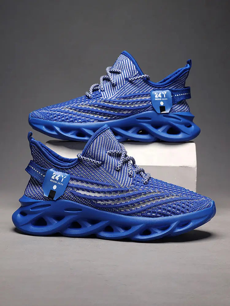 Blue flyknit mesh platform running shoes for men featuring a bold sculpted rubber sole and matching laces.