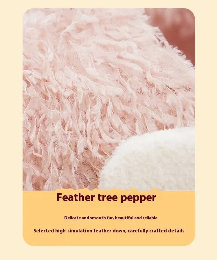 Árbol para gato con forma de flamenco rosa, con poste rascador de sisal rosa, árbol con pluma decorativa suave color rosa pálido y estructura con textura de pelaje delicada y uniforme.